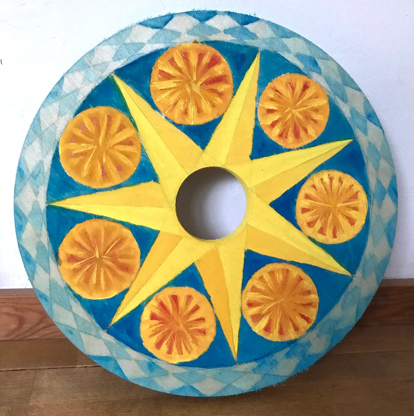 Tähti ja auringot -maalaus